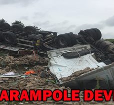 TIR ŞARAMPOLE DEVRİLDİ